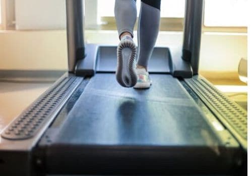 person running on treadmill 