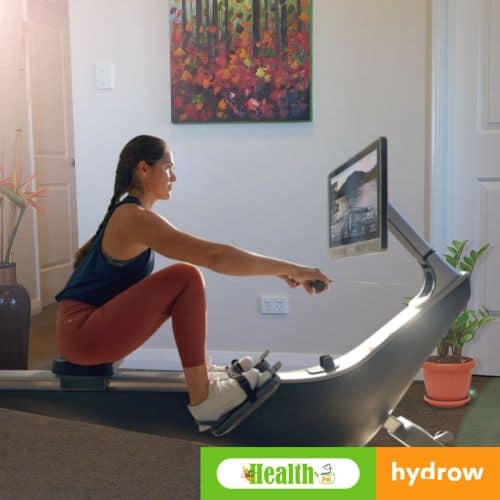 woman using Hydrow Rowing Machine