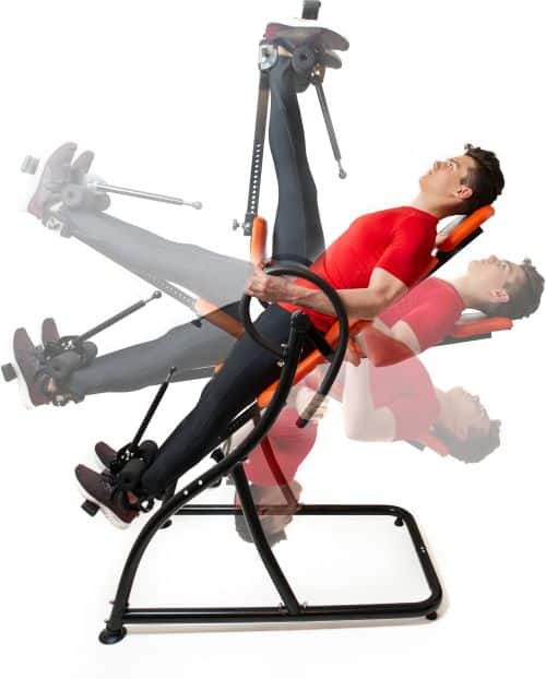 man using an inversion table in various incline positions